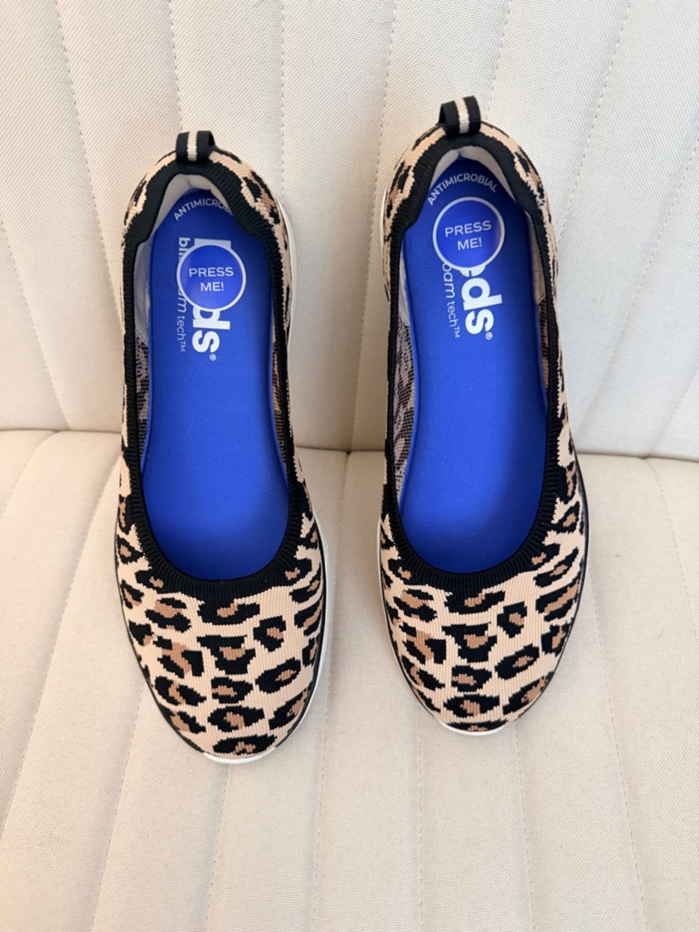 Keds Leopard-Print Slip-On Flats in Beige and Black